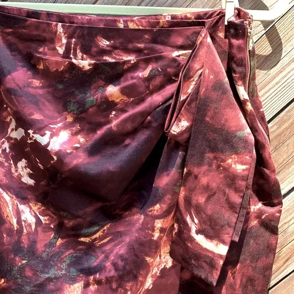 Anthropologie rose print silk faux wrap skirt. New