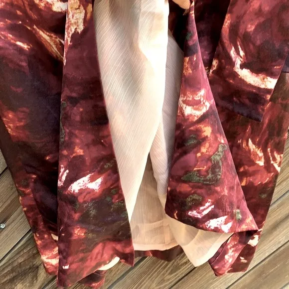 Anthropologie rose print silk faux wrap skirt. New