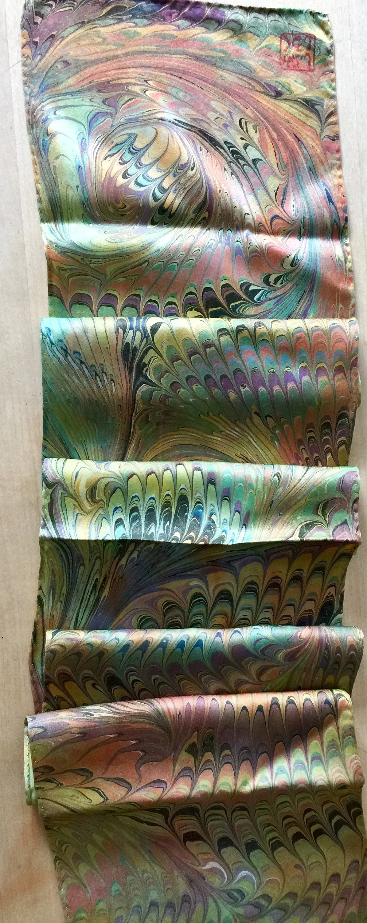 Multi dyed Orange green purple comb Charmeuse  Silk 8x52” bold fun. This beautiful silk makes a unique dresser cover and scarf