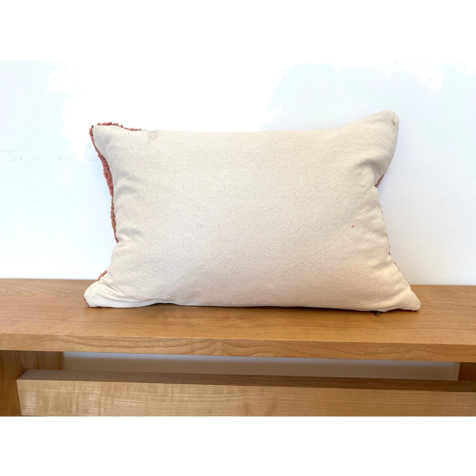 Pink Moroccan lumbar pillow with orange stripe