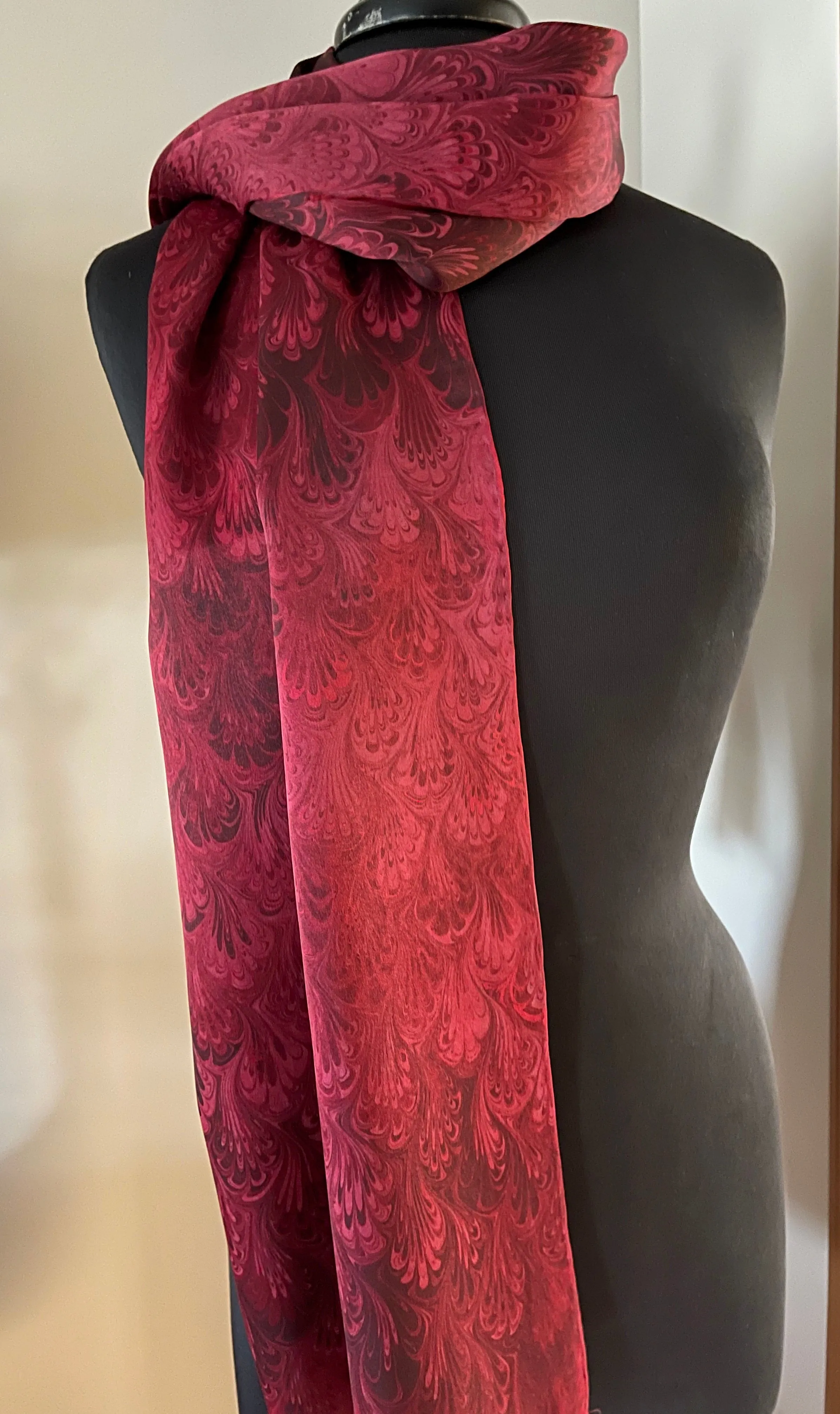Red bouquet marbled Charmeuse  Silk 72x14” bold fun. This beautiful silk makes a unique dresser cover and scarf