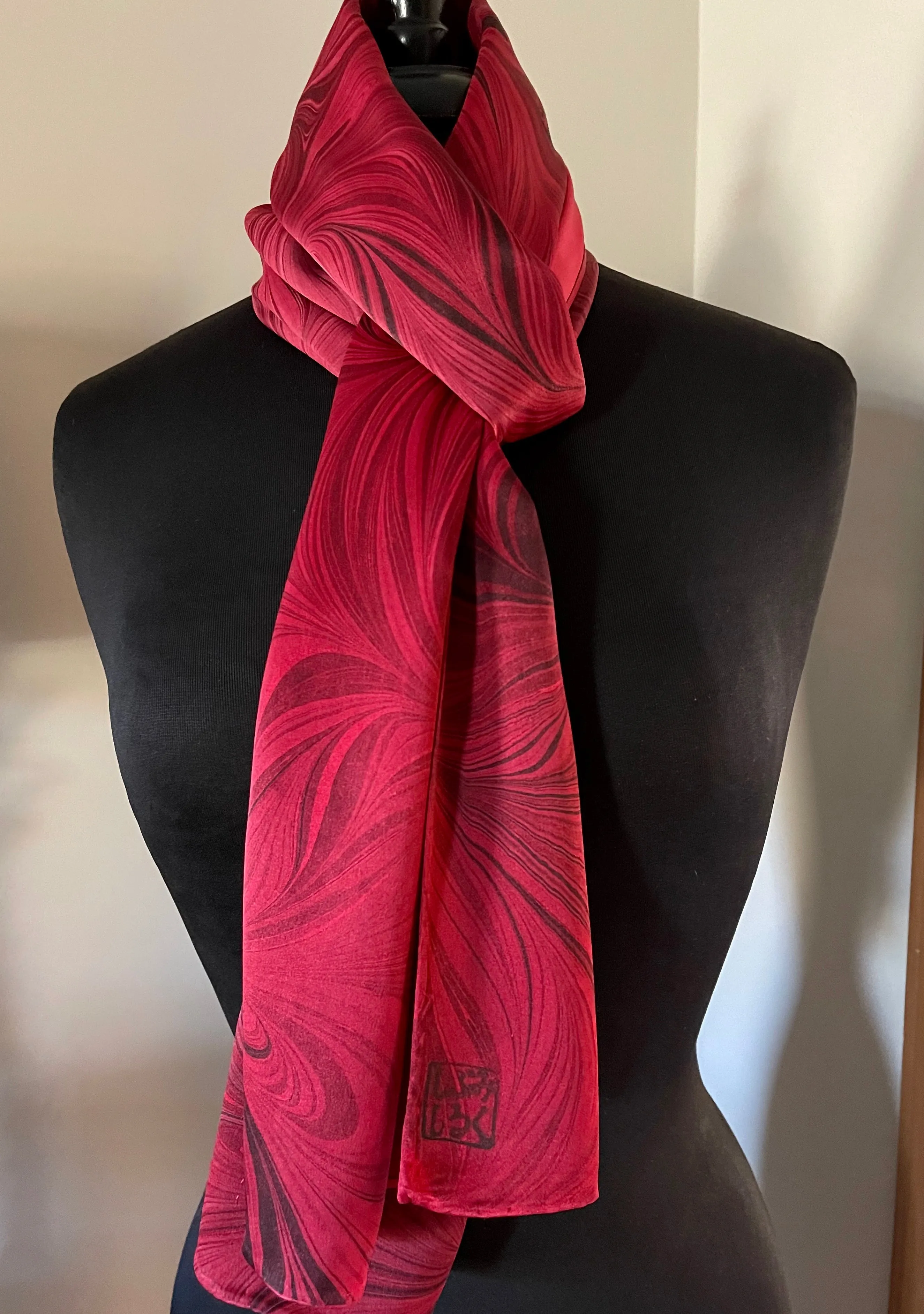 Red flame  marbled Charmeuse  Silk 72x14” bold fun. This beautiful silk makes a unique dresser cover and scarf