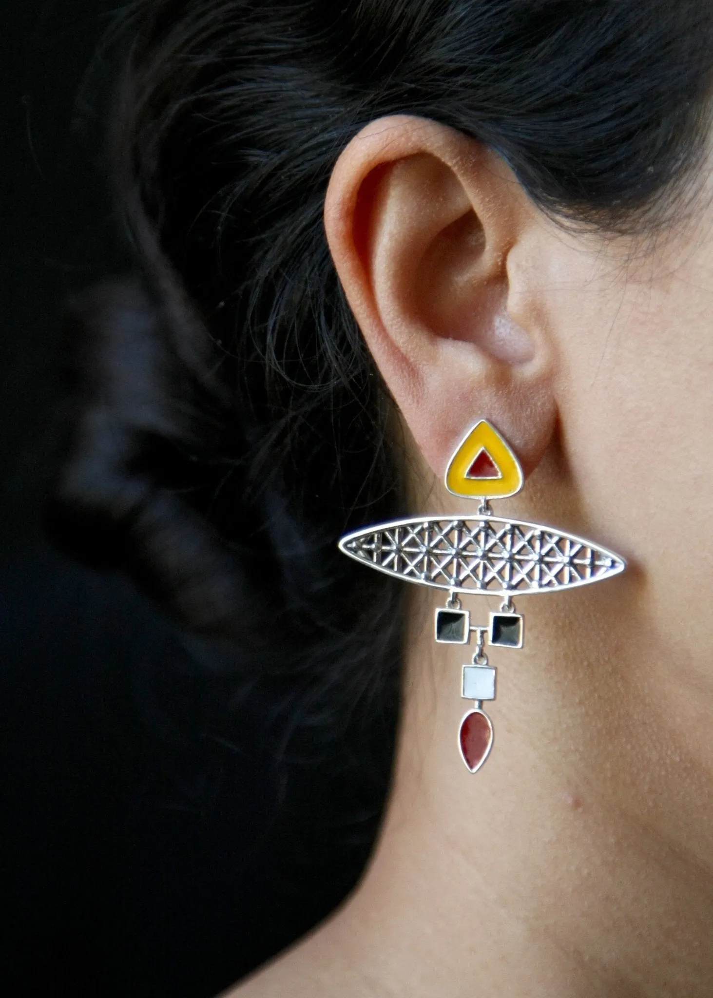TIÉBÉLÉ dramatic, multi-tiered, statement earrings